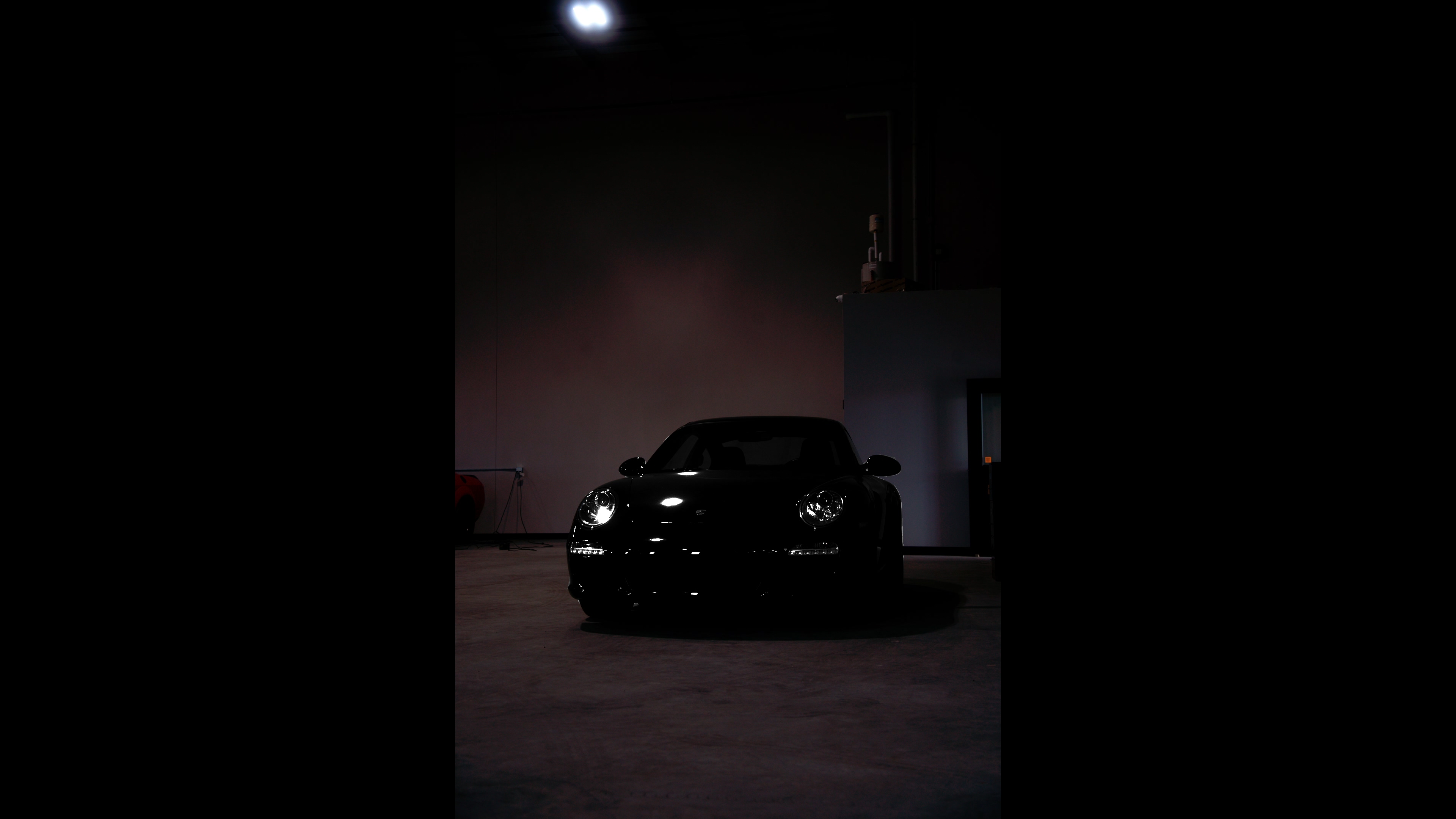 Porsche Carrera S dark studio shoot